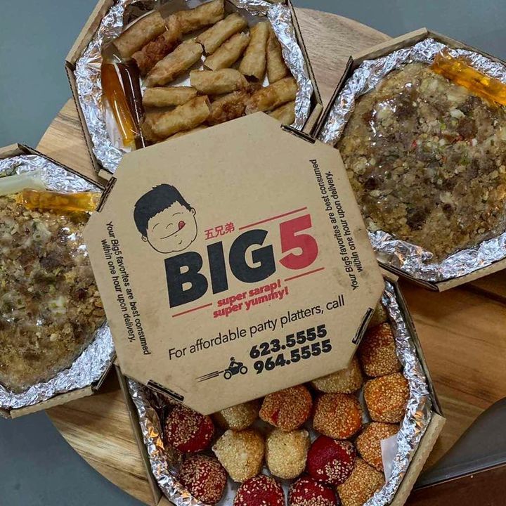BIG5 Delivery branded boxes with assorted Filipino party platters